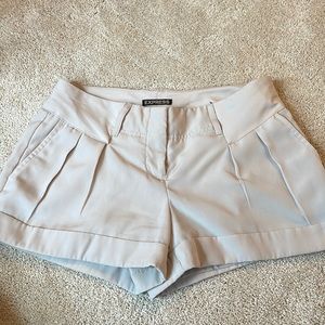 Express pleated dress shorts, light khaki.